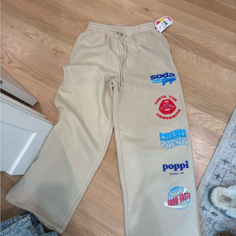 pop Tan Sweatpants with Playful Patches